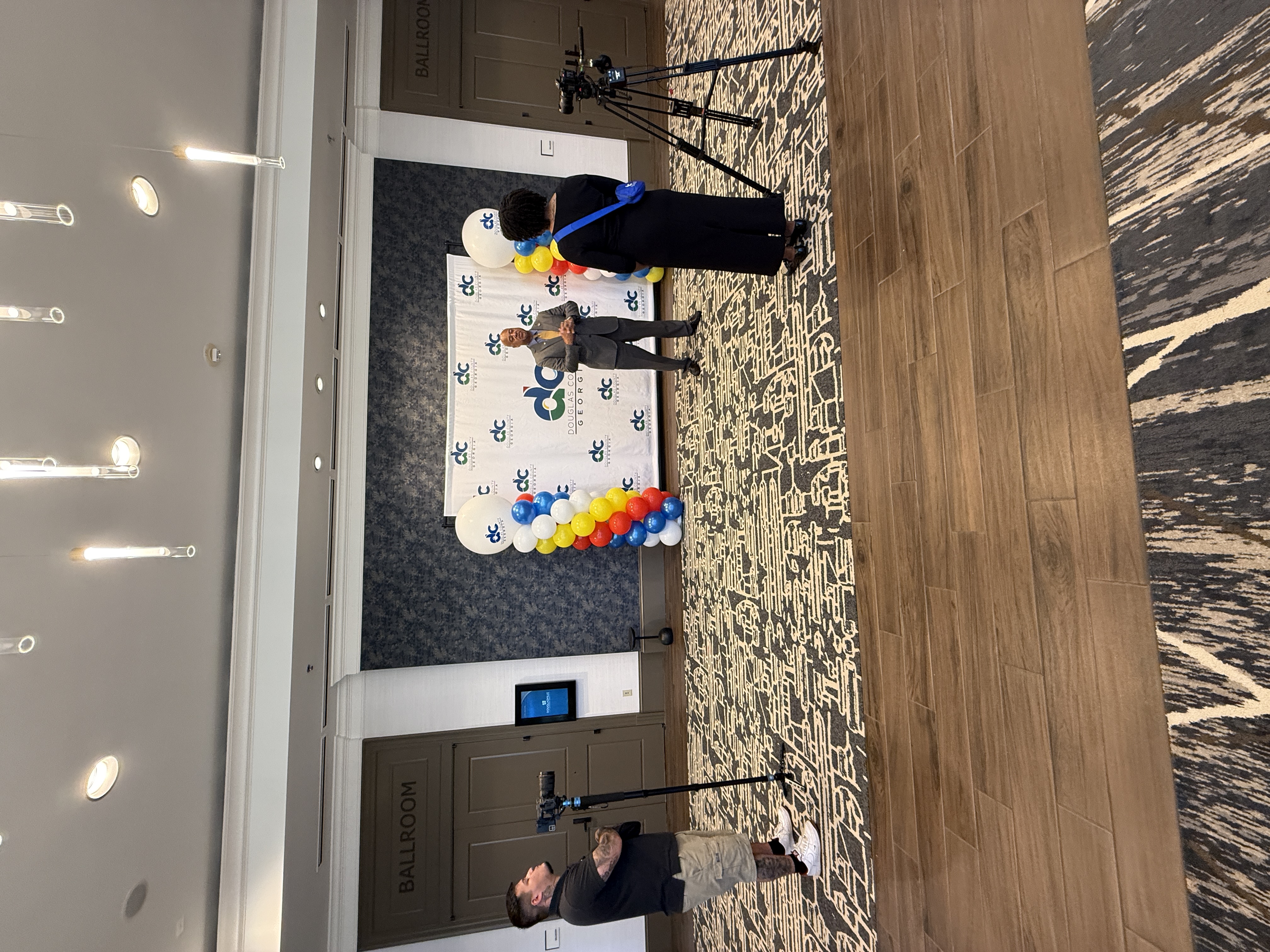 Creator Collective members filming a professional interview on location
